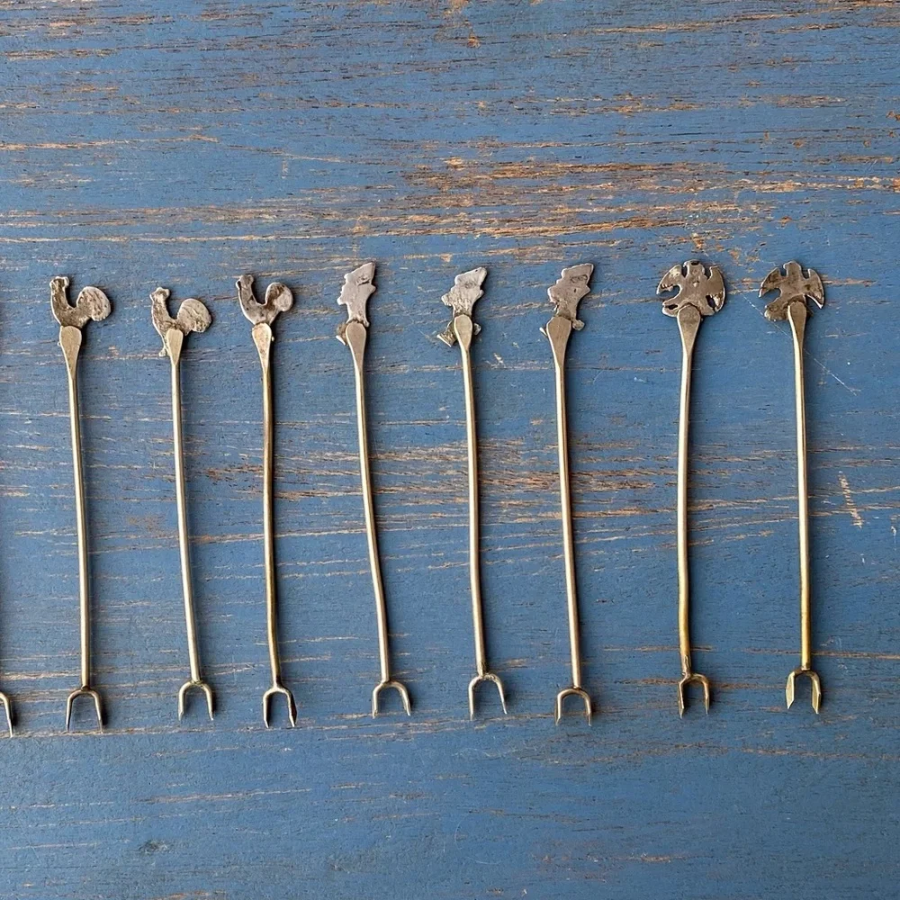 Vintage 12 Handmade Silver Themed hors d’oeuvre Serving Forks Roster Dog Ect.
